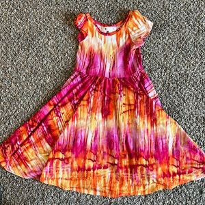 Tie dye pink and orange twirl dress